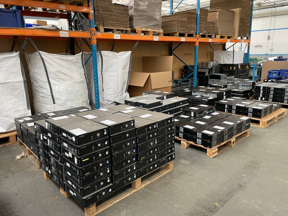 Pallets of computer monitors in our warehouse